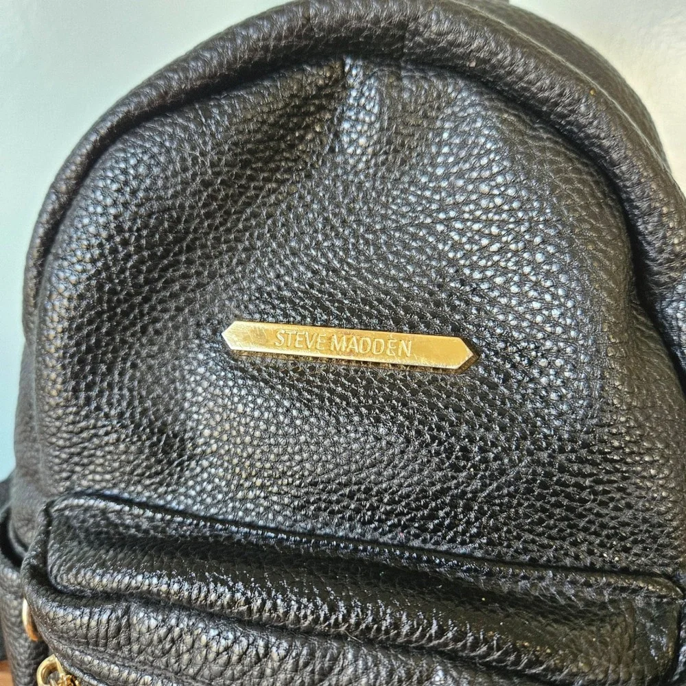 Steve Madden Black Pebbled Leather Mini Backpack Gold Hardware Front Pocket
